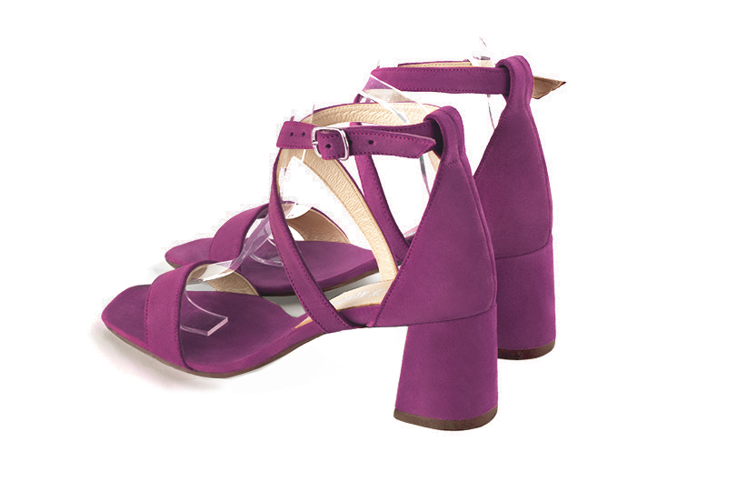 Women's  elegant sandals closed at the back with crossed straps. .  - Rear view